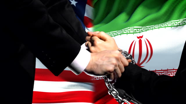 United-States-sanctions-Iran,-chained-arms,-political-or-economic-conflict
