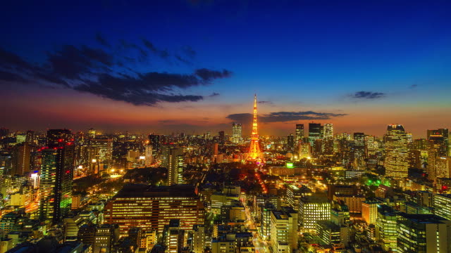 4-K.-lapso-paisaje-urbano-en-la-ciudad-de-Tokio-con-la-torre-de-Tokyo-en-Japón