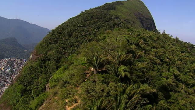 Flying-over-trees-and-hills,-Rio-de-Janeiro,-Brazil