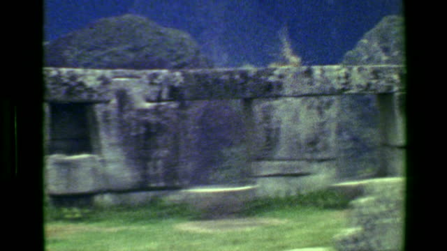 1977:-Stone-monoliths-Machu-Picchu-native-Inca-civilization-building-architecture-focus-ruins.