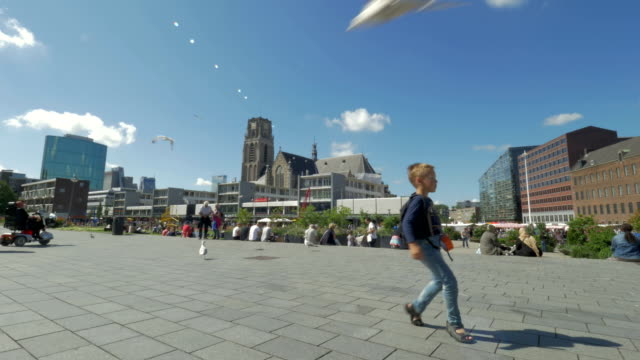 Child-having-fun-and-dancing-on-city-street,-Rotterdam