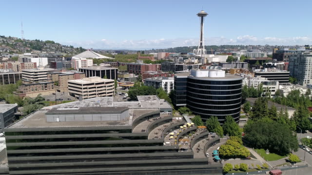 Aerial-of-Downtown-Seattle-Urban-Neighborhoods-and-Business-Buildings-on-Sunny-Day