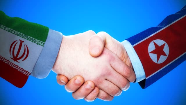 Iran---Nordkorea-/-Handshake-Konzept-Animation-über-Länder-und-Politik-/-mit-Matte-Kanal