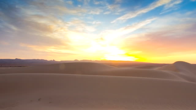 Desert-sand-dunes--sunrise-zoom-out--timelapse