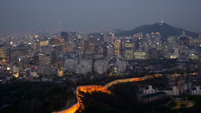 Night-cityscape-of-Seoul,-South-Korea.-Pannnig-shot