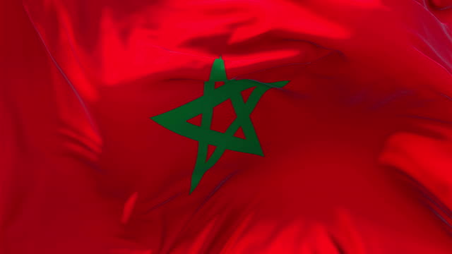 Marokko-Flagge-winken-in-Wind-Slow-Motion-Animation.-4K-glatt-realistische-Stoff-Textur-Flagge-weht-an-einem-windigen-Tag-kontinuierliche-nahtlose-Schleife-Hintergrund.
