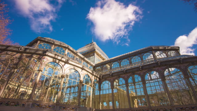 sunny-day-running-clouds-madrid-palacio-de-cristal-top-4k-time-lapse--spain