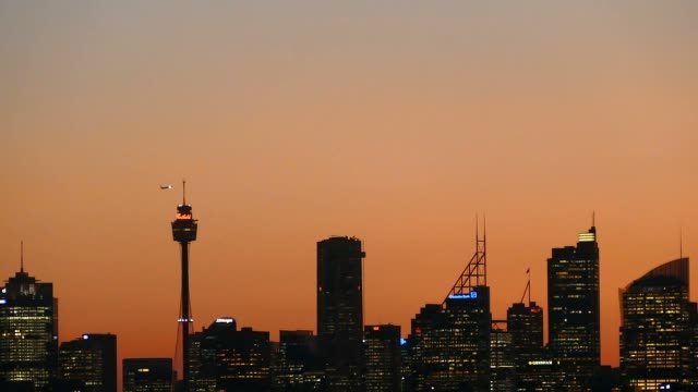 Sydney-Skyline-on-sunset-at-dusk,-featuring-Smog-over-the-Sydney-CBD
