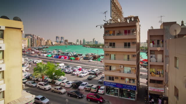 sunny-day-deira-roof-top-dubai-creek-panorama-4k-time-lapse-united-arab-emirates
