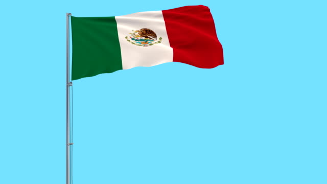 Isolate-flag-of-Mexico-on-a-flagpole-fluttering-in-the-wind-on-a-blue-background,-3d-rendering