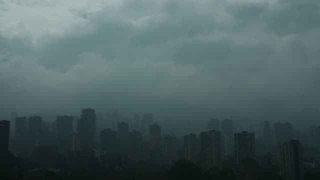 Time-lapse-of-buildings-with-clouds-and-fog-in-Poblado-Medellin-Colombia