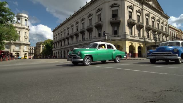 Iconic-view-of-Havana,-Cuba-street--Vintage-Cuban-Taxi-Car
