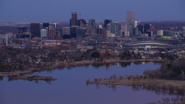 Aerial-view-of-downtown-Denver-at-dusk-from-Sloan-Lake
