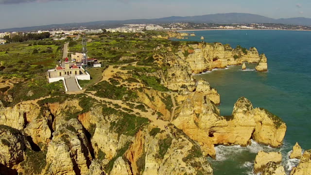 Aerial-from-Lighthouse-and-natural-rocks-at-Lagos-Portugal