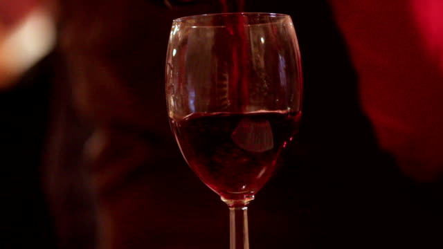 Waiter-Pouring-Red-Wine