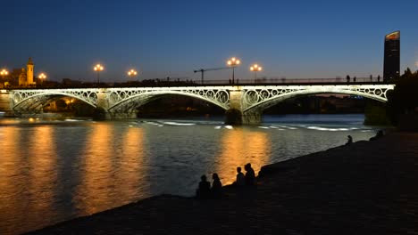 Time-lapse-of-Puente-de-Triana-or-Triana-Bridge-in-Seville,-Andalusia,-Spain