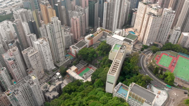 Aerial-tilt-up-shot-of-Hong-Kong-island