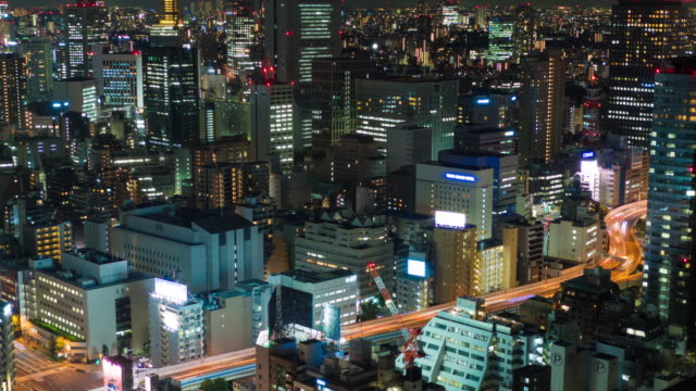 Timelapse-del-horizonte-urbano-de-Tokio.-Carretera-por-la-noche.