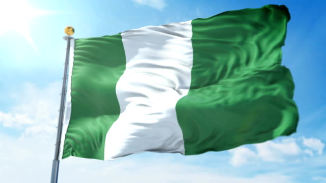 La-bandera-de-Nigeria-sin-fisuras-bucle-video-de-renderizado-3D.-Bella-textil-tela-tela-bucle-agitando