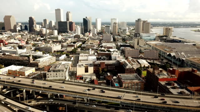 Aerial-View-Rush-Hour-Traffic-Moves-Along-Interstate-Highway-Running-Thru-New-Orleans-Louisiana