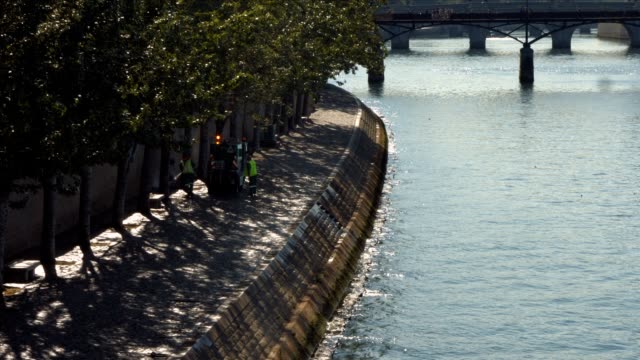 Cleaning-crew-on-Seine-river-bank