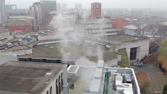Steam-Rises-From-Chimney-Atop-Birmingham-City-Centre-Skyline