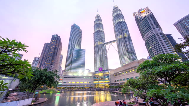 Dramatic-sunset-at-Kuala-Lumpur-City-Centre-fountain-park-where-sky-turn-pink-and-blue-as-the-sun-goes-down.