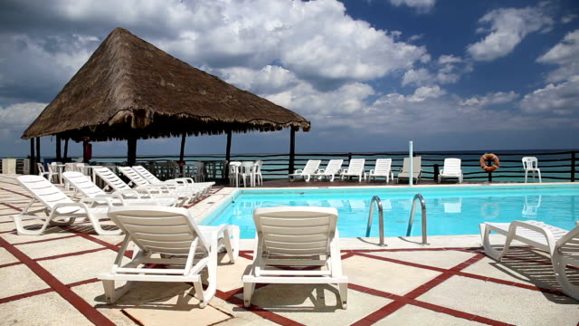 Lounge-sunbeds-near-swimming-pool