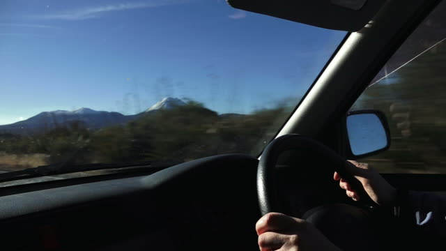 Woman-drive-in-Tongariro-National-Park