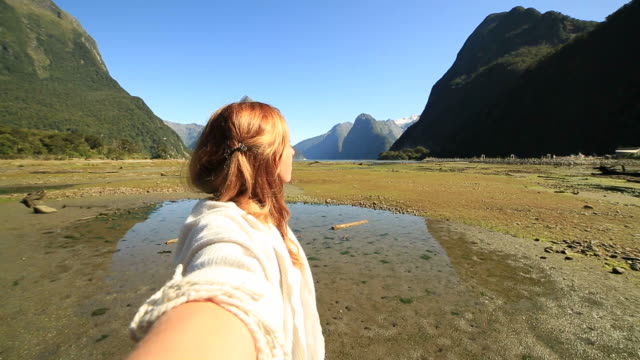 Selfie-point-of-view,-woman-in-mountain-scenery