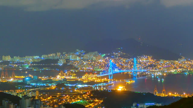 4K,-Time-lapse-View-of-Busan-at-night-with-a-bridge-of-South-Korea