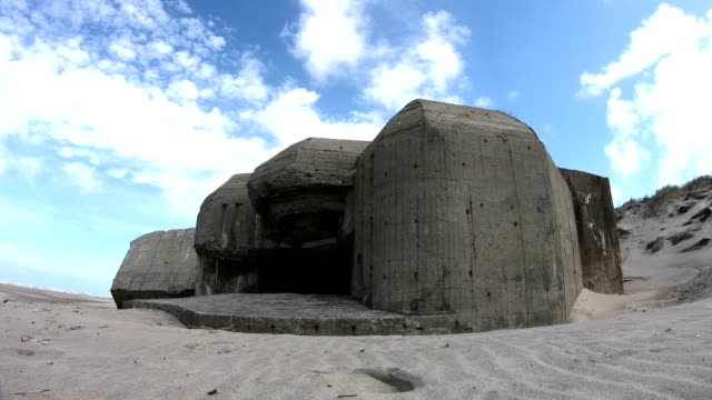 Ruin-of-concrete-Bunker,-Atlantic-Wall,-Second-World-War,-memorial,-North-Sea,-4K