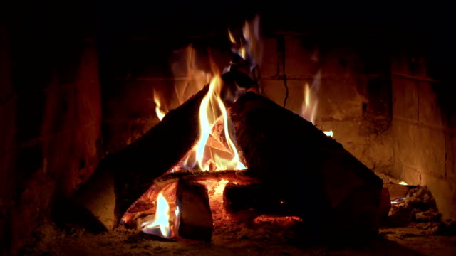Wood-and-embers-in-the-fireplace-Burning-fire-In-the-fireplace.