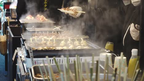 Cooking-food-in-a-Japanese-fish-market