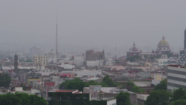 Puebla-skyline-during-evening-time-in-Puebla,-Mexico.