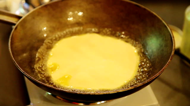 placing-chapati-on-frying-pan