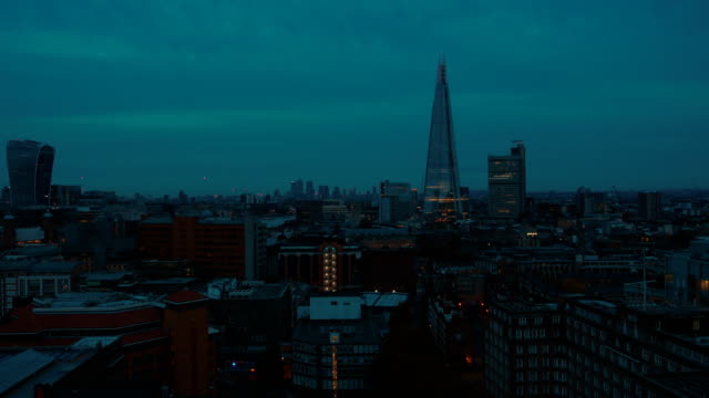 Panning-shot-of-the-Shard-and-south-London-skyline-during-the-blue-hour