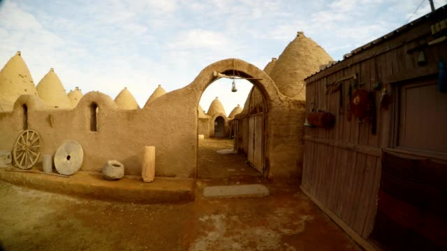 ancient-clay-Arabic-buildings,-close-to-the-border-between-Turkey-and-Syria