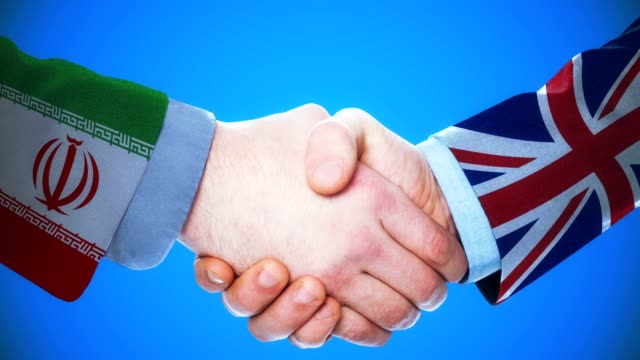 Iran---Vereinigtes-Königreich-/-Handshake-Konzept-Animation-über-Länder-und-Politik-/-mit-Matte-Kanal