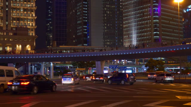 night-illuminated-shanghai-downtown-traffic-square-panorama-4k-china