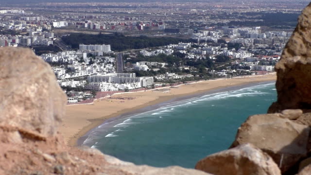 Old-wall-and-Moroccan-city-beach