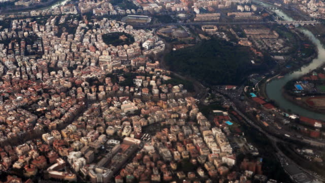 Aerial-view-of-the-beautiful-panorama-of-Rome,-Italy.-Filming-from-the-plane,-famous-capital-from-the-air