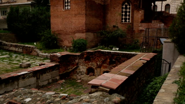 Brick-ruins-of-spiritual-heritage-of-church-in-middle-of-housing-estate,-history