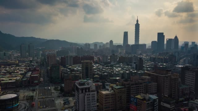 puesta-de-sol-luz-taipei-paisaje-urbano-centro-panorama-4k-Taiwán-timelapse
