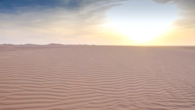 Desert-sand-dunes--sunset-pan--timelapse