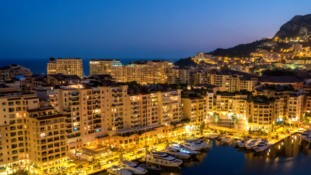 Monaco-Ville-Stadt-Skyline-von-Tag-zu-Nacht-Zeitraffer,-Monte-Carlo,-Monaco-4K-Zeitraffer