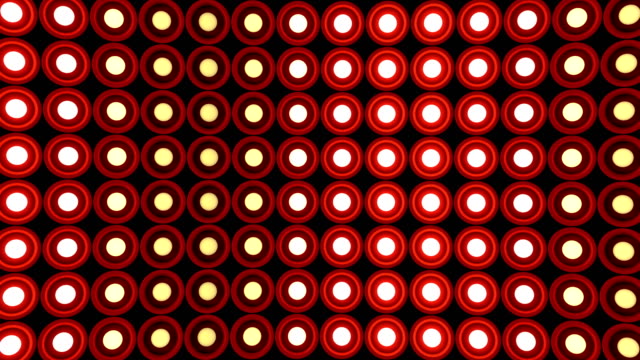 Lights-flashing-wall-round-bulbs-pattern-rotation-stage-red-background-vj-loop