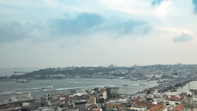 Lovely-Sunset-Time-Lapse-Video-of-Golden-Horn-Istanbul-from-Galata-Tower-with-Hagia-Sophia,-Topkapi-Palace,-Bosphorus,-Blue-Mosque-and-Grand-Bazaar-View