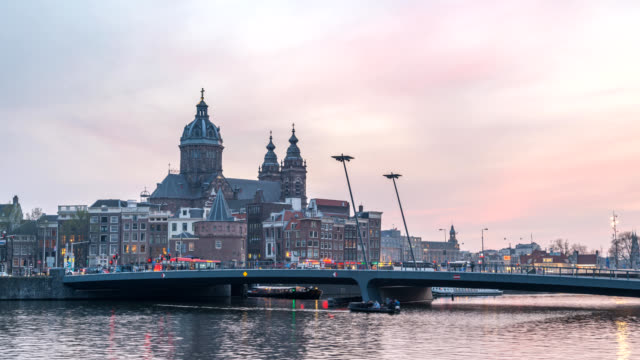 Amsterdam-Netherlands-time-lapse-4K,-city-skyline-day-to-night-timelapse-at-Basilica-of-Saint-Nicholas