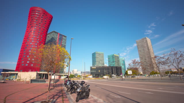 street-panorama-day-light-barcelona-porta-fira-hotel-building-4k-time-lapse-spain